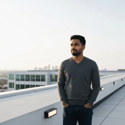Person organizing legal documents on a desk with a laptop and pen